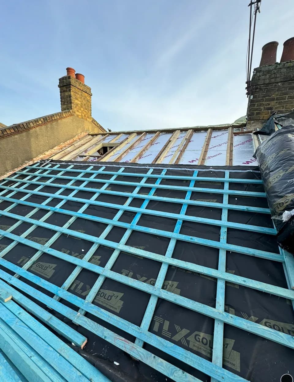 TLX Gold insulation and battens installed across a pitched roof